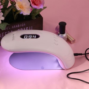 Nainen voi pitää puolet taivaan kevyestä terapiavalaisimesta Rainbow 2